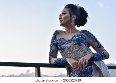 Bandung, Indonesia - August 19, 2019: woman in kebaya. Indonesian traditional clothes.