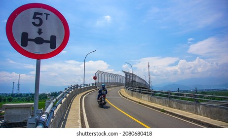 Bandung, Indonesia – November 18, 2021: Motorcycle Riders Pass Through The Gedebage Flyover Which Has A Tonnage Limit.