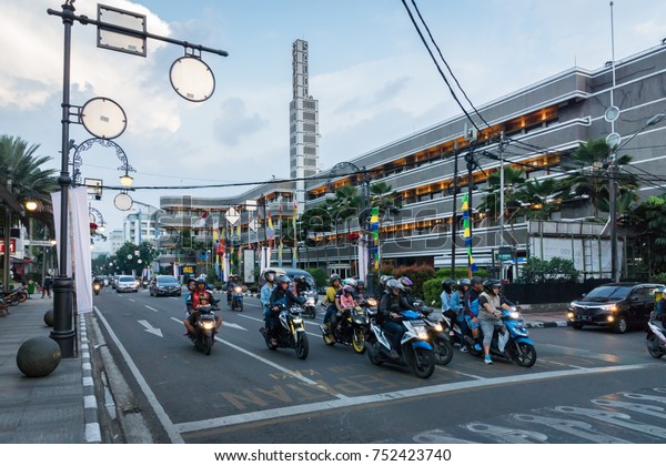 Bandung, Indonesia - October 2017 : Bandung\
city traffic in the central area street, downtown view. Bandung is\
capital of Indonesia’s West Java\
province.