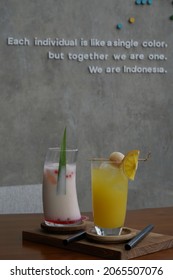 bandung, indonesia on oct 25, 2021: defocused. soft drink on the table in the hotel cafe in the afternoon. selective focus