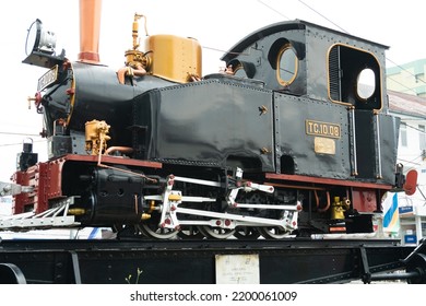 Bandung, Indonesia - September 9th 2022 : An Old Model Of Locomotive Of Train In Front Of Bandung Railway Station Or Stasiun Kereta Api Bandung