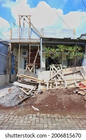 Bandung July 2021-the House That Is Being Renovated Is Very Messy. There Are Many Materials For Renovating Placed In Front Of His House.