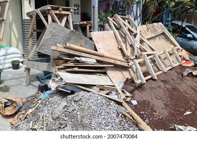 Bandung July 2021-the House That Is Being Renovated Is Very Messy. There Are Many Materials For Renovating Placed In Front Of His House.