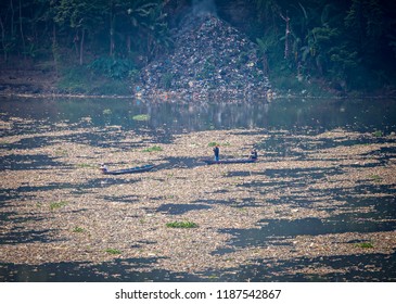 Bandung Regency, West Java, Indonesia (05/25/2017) : The Ocean Of Garbage In The Citarum River. People Collecting Plastic Garbage In The One Of Polluted River In Indonesia.