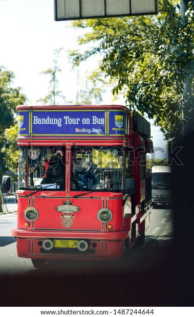BANDUNG, WEST JAVA - 25\
August 2019; Bus tours that are similar to buses in Europe to take\
tourists who want to get around Bandung or commonly known (Paris\
Van Java) Indonesia