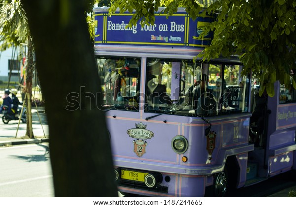 BANDUNG, WEST JAVA - 25\
August 2019; Bus tours that are similar to buses in Europe to take\
tourists who want to get around Bandung or commonly known (Paris\
Van Java) Indonesia