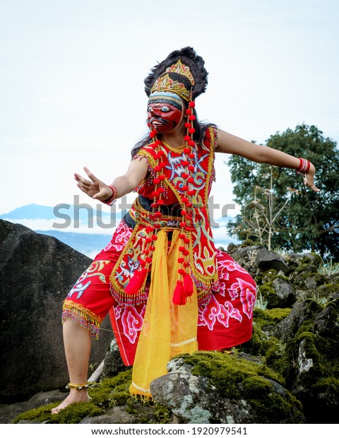 Bandung, West Java Indonesia -10 January 2021:\
a dancer demonstrates a traditional Indonesian dance commonly known\
as the \