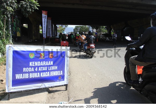 Bandung,\
West Java, Indonesia - April 23, 2020 : Information board about the\
appeal at the intercity border interception\
post