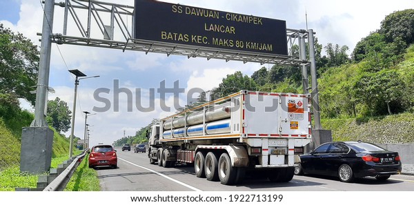 \
Bandung, West Java\
Indonesia - February 23, 2021:\
The object of the VMS (Variable\
Message Sign) building is on the Purbaleunyi toll road, Bandung\
city, West Java,\
Indonesia