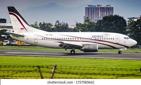 Bandung, West Java / Indonesia - January 16th, 2019: Xpress Air Boeing 737-500 Classic (reg. PK-TZD) Backtrack At Husein Sastranegara International Airport.