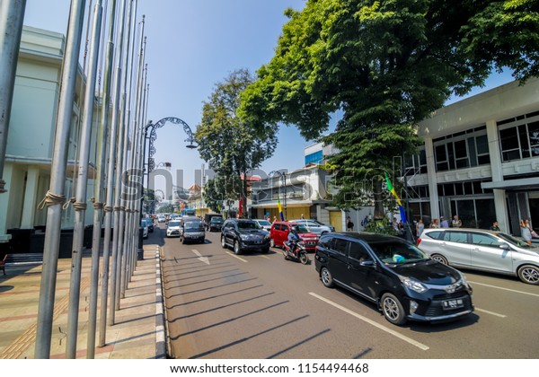 Bandung, West Java / Indonesia - July 25th\
2018: Vehicles Traffic in Jalan Asia Afrika\
