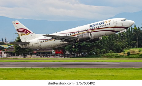 Bandung, West Java / Indonesia - March 10th, 2019: Xpress Air Boeing 737-300 Classic (reg. PK-TXI) Taking Off From Runway 29 Husein Sastranegara International Airport.