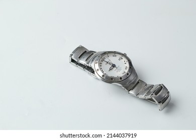 Bandung,Indonesia April09-2022:Elegant Silver Men's Watch,negative Space,on White Background,soft Focus And Shinny Texture