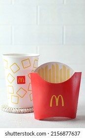 Bandung,Indonesia May17-2022:several packaging variants for soft drinks and french fries from mac donalds,on white background