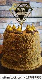 Bandung,indonesia-may 23th,2021-nut And Choco Birthday Cake With Gold Topper