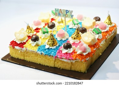 Bandung,indonesia-september 2022-colorful Sweet Tart With Cream, Marshmelow, Chocolate, Candy For A Child's Birthday. Birthday Cake. Delicious Cake. Homemade Cake