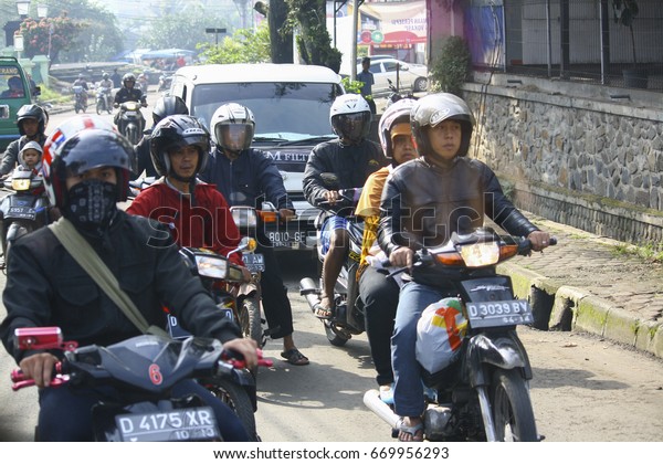 bandung,west java,indonesia-april 21 2013(traffic\
at bandung street)