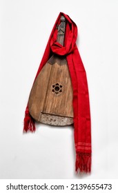Bandura with cultural red scarf.tif