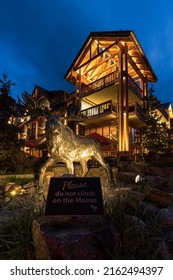 Banff, Alberta Canada - May 31, 2022: Moose Statue In Downtown Banff Outside A Lodge Hotel