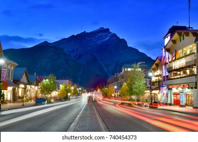 BANFF ALBERTA,CANADA - SEPTEMBER 29, 2017 : Street view of famous Banff Avenue at twilight time. Banff is a resort town and one of Canada's most popular tourist destinations.