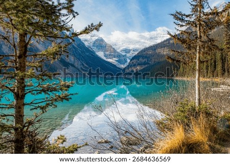 Banff Canada Reflection in the Fall with Trees and Snowy Mountains