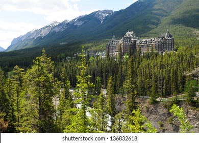 Banff Springs Hotel in the Canadian Rockies with Bow River in the foreground