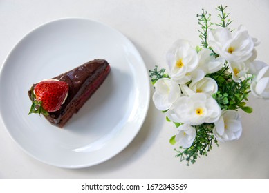 Bang Yai, Thailand June 7, 2018 Soft Chocolate Cake With The Aroma Of Chocolate And Fresh Milk Custard, Which Is Stuffed In The Cake Layer And Have Fresh Strawberries On The Cake, Along With Fresh Cre