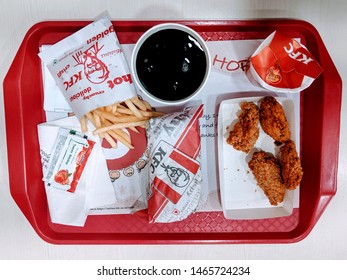 Bangalore, India - 30 July 2019 : Food Tray At KFC. Chicken Wings, Potato Fries, Popcorn Chicken, Ketchup, Longer And Pepsi