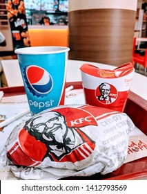 Bangalore, India - 30th May 2019 : KFC Meal Consist Of Burger, Pepsi, Fries And Chicken Popcorn. KFC Is A Popular American Fasts Food Chain