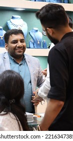 Bangalore, India 4th May 2022: Indian Customer In A Jewellery Exhibition Buying Gold On The Occasion Of Dhanteras And Vijayalaxmi. Traditional Ornaments With Marvelous Stones And Intricate Designs.