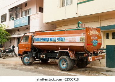 BANGALORE, INDIA - JULY 15: A Water Tanker Supplies Water To A Home On July 15, 2011 In Bangalore. Many Parts Of Urban India Are Experiencing Acute Water Shortage As Cities Expand Rapidly.