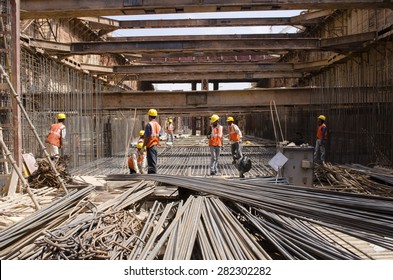 Bangalore, Karnataka, India - January 21, 2014: Unidentified Workers Are Employed In Construction Overhead Metro In Bangalore City