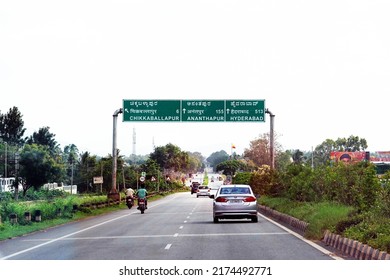 Bangalore, Karnataka, India, June 26, 2022: Multilingual Highway Overhead Road Sign Showing Distance To Hyderabad, Ananthapur And Chikkaballapur.                             