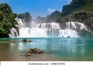 Bangioc / ban gioc or Detian waterfall in Cao bang, north Vietnam. These falls form the natural border between Vietnam and China. Slow shutterspeed silky smooth waterfalls. - Powered by Shutterstock