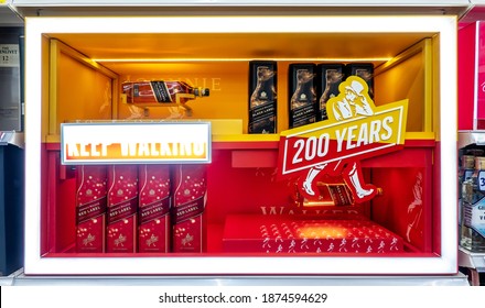 Bangkok, Thailand–Dec 10, 2020: Shelves of Johnnie Walker Whisky Bottles, Popular variants of Johnnie Walker Scotch Whiskey at an aisle of a liquor store or supermarket