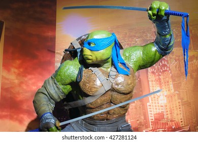 BANGKOK - APR 29, 2016 : Fiberglass Mascot of Ninja Turtle Blue "Leonardo da Vinci" photobooth set up to promote the Ninja Turtles Movie, Bitec Bangna. Dramatic Tone with high contrast. Grained.