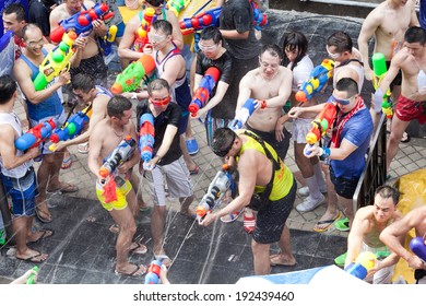 BANGKOK - APRIL 14,2014: BANGKOK - A Water Fight During Songkran Festival Celebrations On Silom Road In Bangkok Thailand.