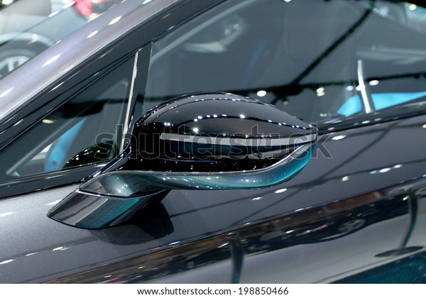 Bangkok - April 2 : Side\
mirror of  BMW series I8 innovation car - in display at 35th\
Bangkok International  Motor Show 2014 on April 2,2014 in Bangkok\
Thailand