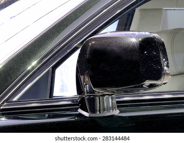 Bangkok - April 2 : - wing mirror of black Rolls Royce in display at The 36th Bangkok international Motor Show 2015 on April 2, 2015 in Bangkok Thailand - Shutterstock ID 283144484