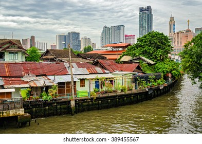 Bangkok Channel And Constrast Between Poor And Rich Houses