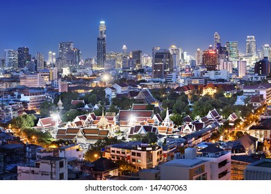 Bangkok   city  rooftop view  at night .  This is beautiful city at  night , Many hotel, temple and height  building for business  stand in the heart of Bangkok,Thailand. - Powered by Shutterstock