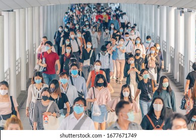 Bangkok City, Thailand : 03/12/2020 : Unidentified people, Crowd of Thai wearing face mask for health due to Coronavirus Disease or covid-19 and air pollution in mass transit in public. Rush hour.