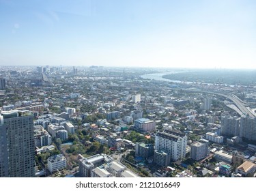 Bangkok Cityscape from top view. The Bangkok city is capital of Thailand country have a lot of property, main skytrain railway and road living with river
