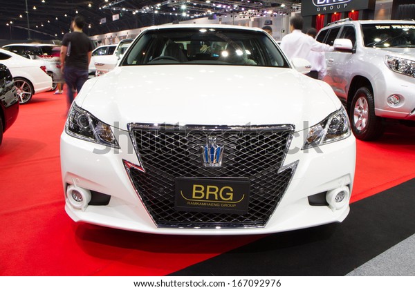 BANGKOK -\
December 9:  TOYOTA Crown Car Import by BRG on display at The 30th\
Thailand International Motor Expo at Impact Muang Thong Thani on\
December 9, 2013 in Bangkok, Thailand\
