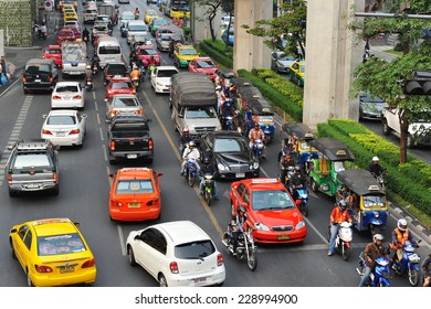 BANGKOK - JAN 23: View of a traffic jam on a city centre road on Jan 23, 2013 in Bangkok, Thailand. With the government's first car policy, gridlocked streets in the Thai capital have increased.