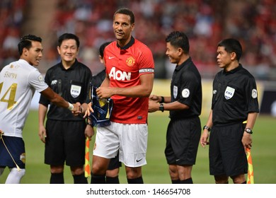 BANGKOK - JULY 13: Captain Team Rio Ferdinand Of Man Utd. During Singha 80th Anniversary Cup Manchester United Vs Singha All Star At Rajamangala Stadium On July 13,2013 In Bangkok, Thailand. 