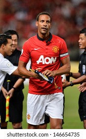 BANGKOK - JULY 13: Captain Team Rio Ferdinand Of Man Utd. During Singha 80th Anniversary Cup Manchester United Vs Singha All Star At Rajamangala Stadium On July 13,2013 In Bangkok, Thailand. 