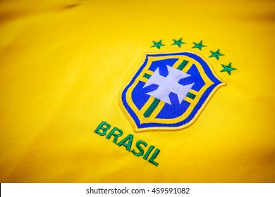 BANGKOK - July 17 : Logo Brazil Flag Football Printed On Yellow Sport Shirt. One Of Famous Sport Team Worldwide On July 17, 2016 In Bangkok, Thailand.