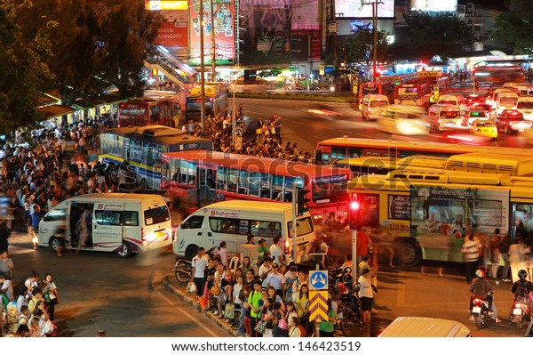 BANGKOK - JULY 5: Crowded public transport. Many\
passengers waiting for the bus queue. At Victory Monument.,\
Thailand on July 5,\
2013.