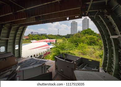 BANGKOK - June 22: Remains Of A Wrecked And Graffitied Boeing 747 And Two McDonnell Douglas MD-80s In A Field In Bangkok, Thailand Never To Be Flown Again. Now Home To A Family.